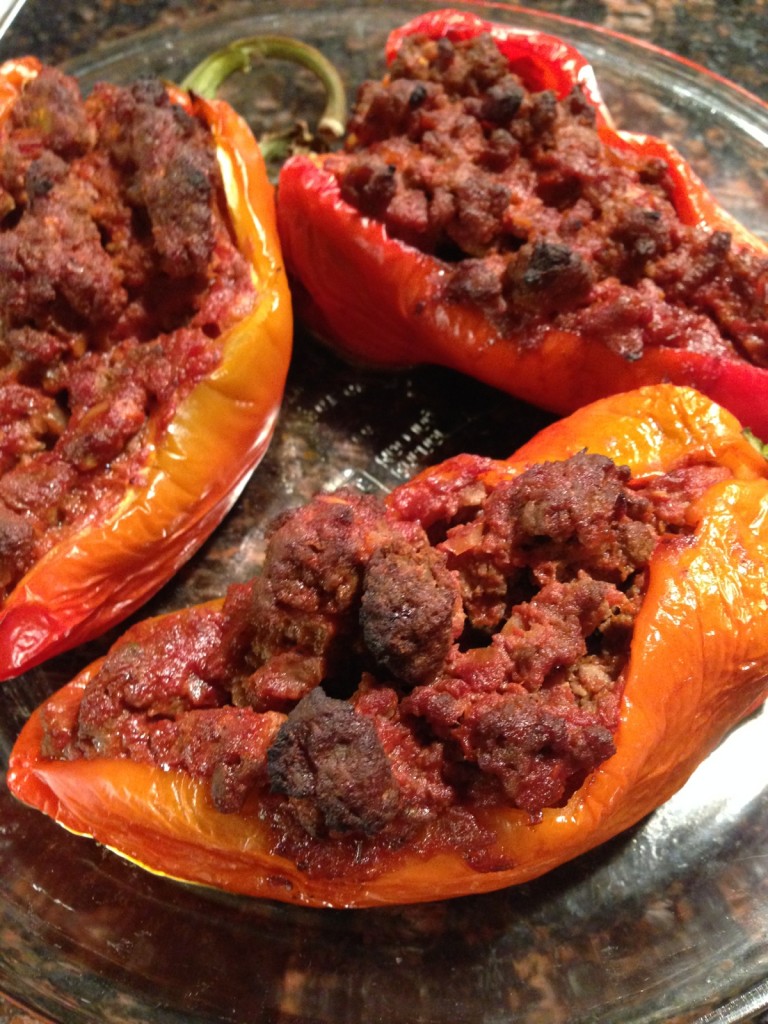 Farmer's market peppers stuffed with grass-fed ground beef, onions, garlic, tomatoes, and diced peppers.
